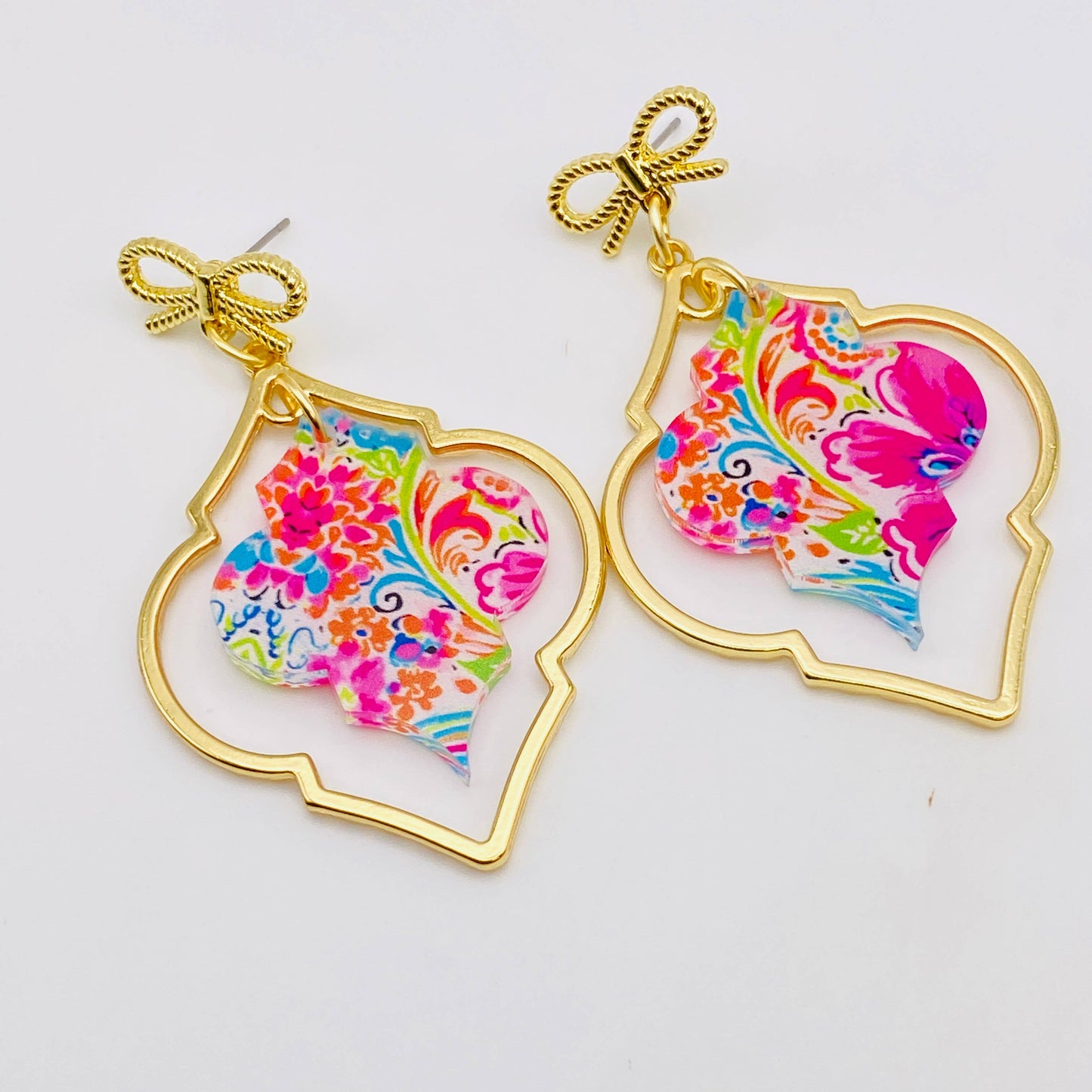 GOLDEN BOW DAZZLE ACRYLIC DANGLE EARRINGS