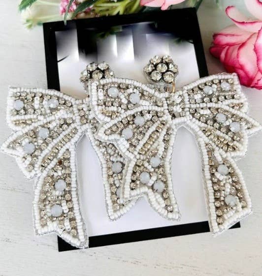 CHRISTMAS HOLIDAY WHITE BOW BEADED EARRINGS